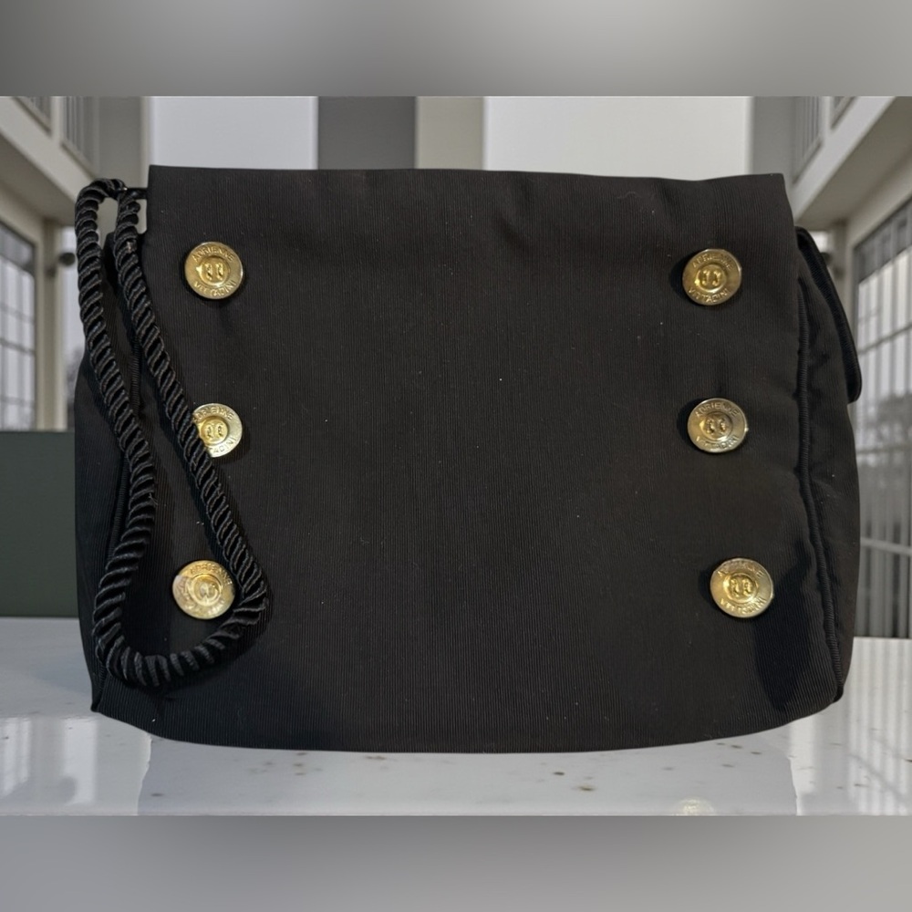 Adrienne Vittadini Vintage Ribbed Clutch With Gold Toned Buttons.